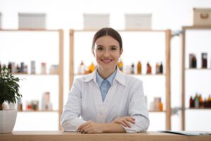 Ancillary Business - Portrait of Happy Female Pharmacist in Cannabis Business